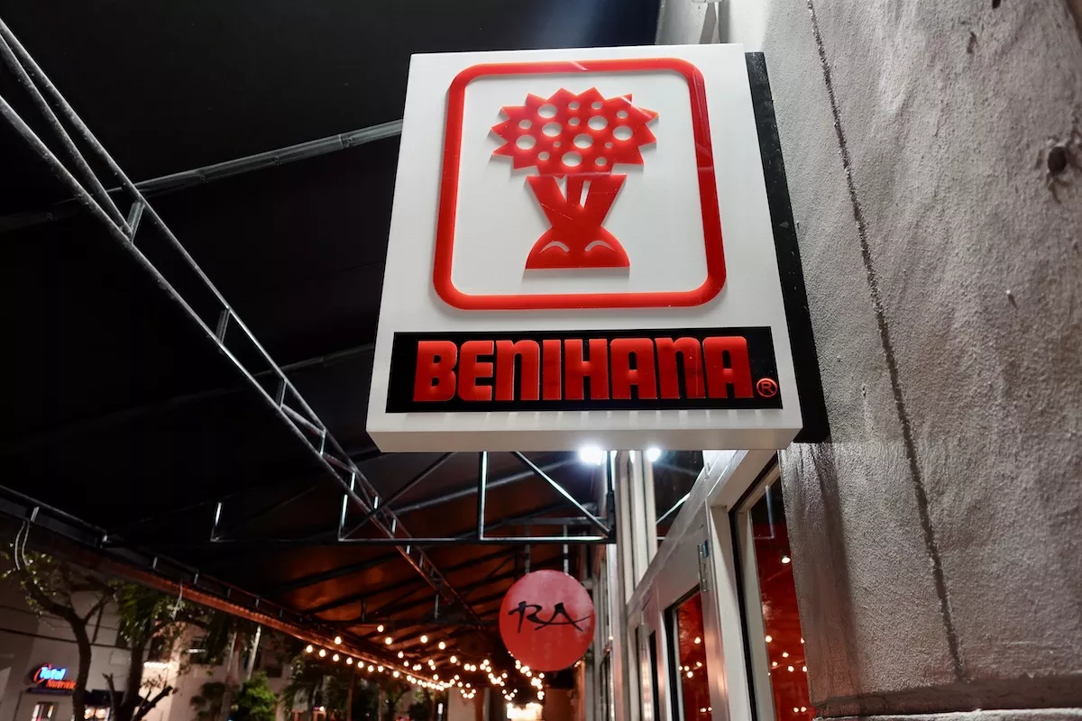 Exterior signage for Benihana with hanging lights and RA Sushi logo in background